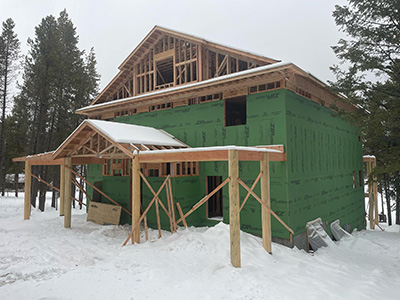 Framing a custom cabin front entrance in Island Park