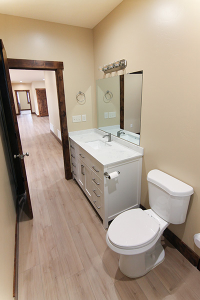 Custom home bathroom with large vanity and bathtub