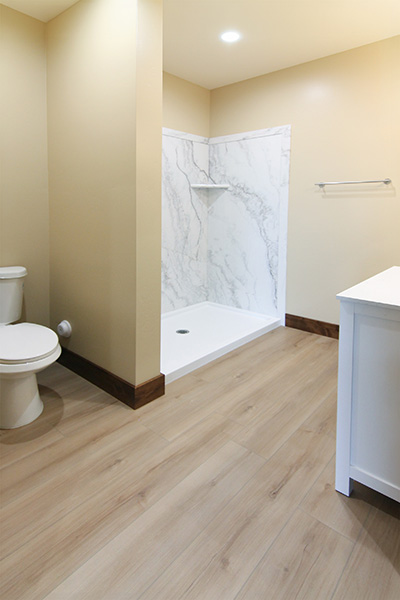 Custom home master bathroom with vanity and walk-in shower