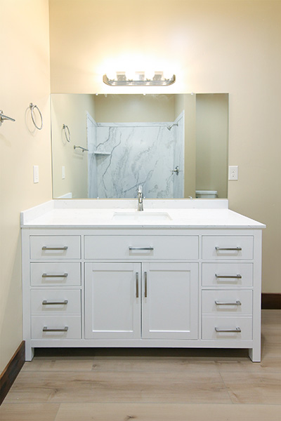 Custom home master bathroom vanity with lots of storage drawers