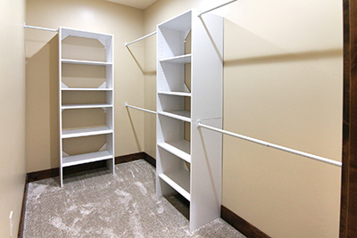 Custom home master bedroom suite with walk-in closet