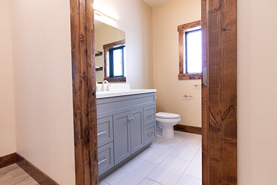 Custom home bathroom with large vanity and bathtub