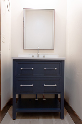 Custom home bathroom with designated guest bathroom